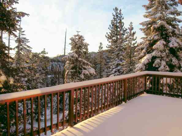 Overlook several snow-capped mountain ranges and Heavenly
              Ski Area from 1000 square feet of private deck and many windows.